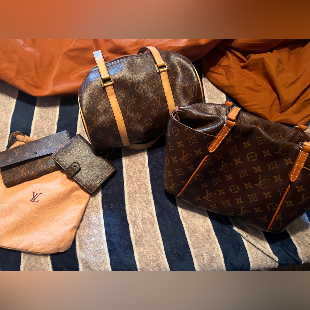 Louis Vuitton lot.  needs a lot of TLC.